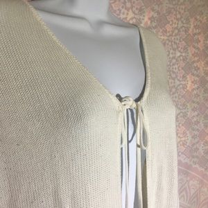 DEFINITELY loose knit, long flare sleeve cardigan